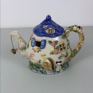 Charming Cottage Teapot Candle Holder with Floral Design